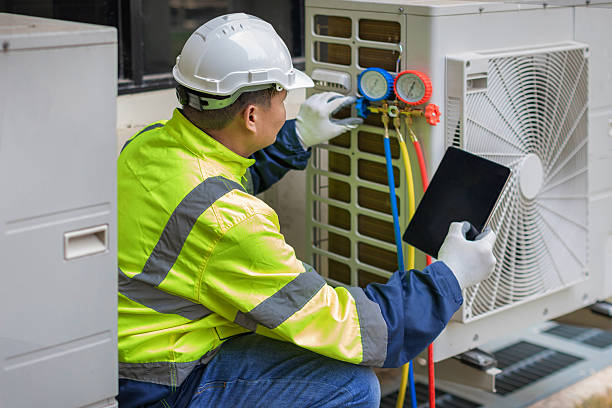 Professional Hvac technician working in Dewitt, IL